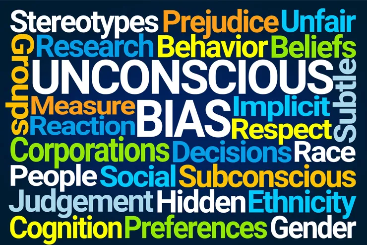 Team discussion highlighting how DEI reduces unconscious bias, emphasizing understanding DEI in the workplace and why DEI is important.